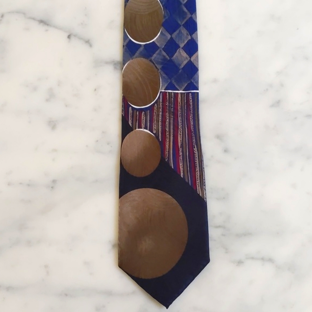 NWOT. Oaktree Imported Silk Tie with Multicolor Design Patterns.